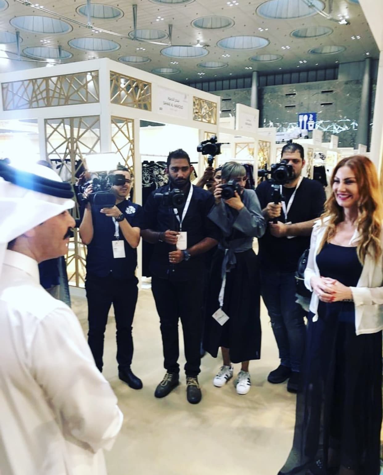 Valeria Mangani meeting the press at an international trade show.